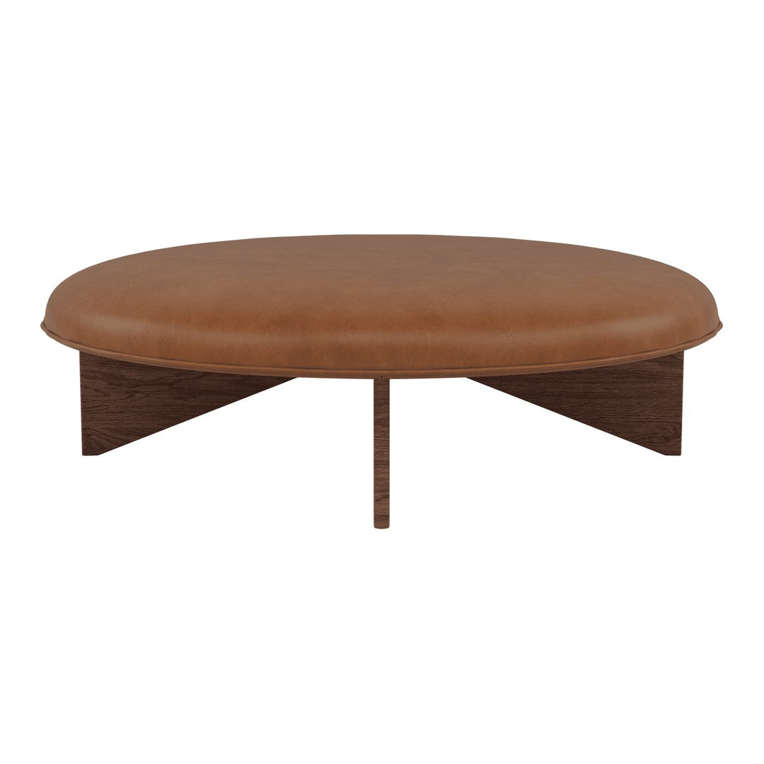 Round coffee table features a rich brown leather top and sleek wooden base, creating a modern, minimalist aesthetic.