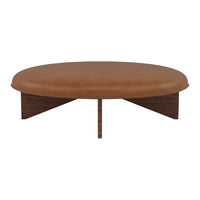 Round coffee table features a rich brown leather top and sleek wooden base, creating a modern, minimalist aesthetic.