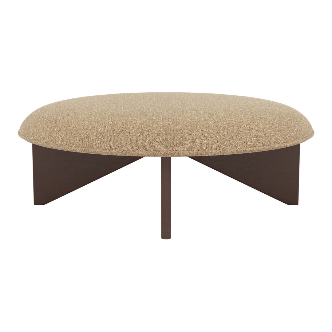 Round beige upholstered ottoman with dark brown geometric legs, featuring a textured fabric pattern.