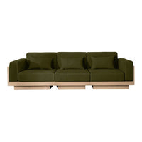 Olive green fabric sofa with plush cushions and minimalist wood base, perfect for modern living spaces.
