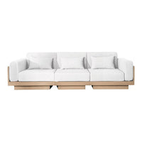 White modern sofa with plush cushions and a light wooden base, featuring a clean, minimalist design.