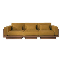 Stylish modern sofa in mustard yellow upholstery with a sleek brown base, featuring clean lines and plush cushions.