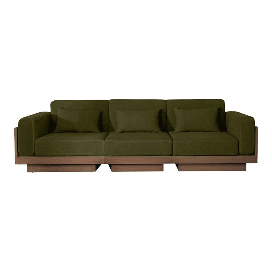 Olive green sofa with three plush cushions and a sleek wooden base, showcasing a modern and minimalistic design.