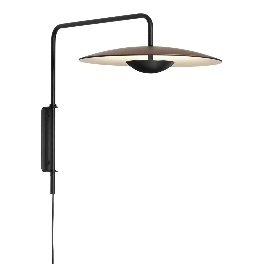 Sleek black wall lamp with a round, beige shade and smooth, minimalist design. Perfect for modern decor.