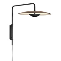 Sleek black wall lamp with a round, beige shade and smooth, minimalist design. Perfect for modern decor.
