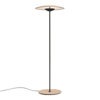 Minimalist black and beige floor lamp with a sleek, round shade and smooth, modern finish.