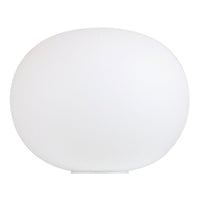 White, smooth oval lamp with a sleek, modern design, perfect for contemporary home decor.