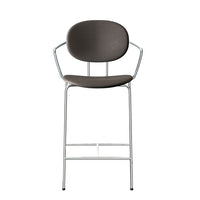 Brown upholstered bar stool with sleek chrome legs, featuring a smooth, minimalist design. Perfect for modern decor.
