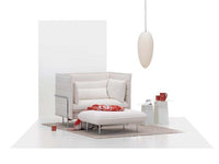 Modern white seating set with soft cushions, featuring a vibrant red throw and subtle geometric patterns.