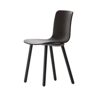 Minimalist black chair with a smooth, sleek finish and straight black legs, perfect for modern decor.
