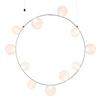 Modern circular chandelier with a sleek metal frame and soft white glass globes, creating an elegant and minimalist look.