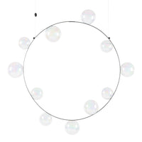 Circular light fixture with iridescent bubbles and a sleek metallic frame, highlighting soft pastel colors.