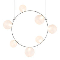 Modern circular pendant light featuring six frosted white glass globes on a sleek black frame.