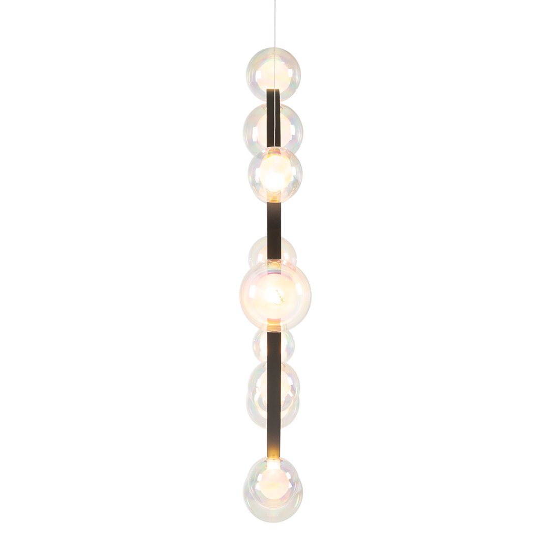 Modern pendant light featuring clear glass orbs balanced on a sleek black rod, offering a minimalist aesthetic.