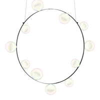 Circular black pendant light with soft pastel-colored bubbles, creating a whimsical and airy aesthetic.