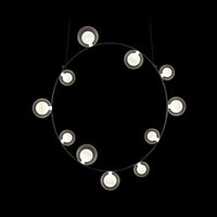 Modern circular pendant light with white bulbs against a sleek black background, showcasing minimalistic design.