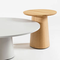 Modern white and natural wood side tables with smooth finishes and minimalist design. Perfect for contemporary decor.