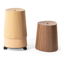 Natural wood stools featuring light blonde and rich walnut finishes with smooth textures.