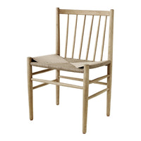Natural wood chair with light beige tones and a minimalist design featuring vertical slats and a woven seat.
