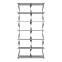 Gray metal shelving unit with a sleek, modern design featuring geometric open patterns and ample storage space.