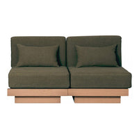 Olive green upholstered sofa with two matching cushions on a light wood base, perfect for modern decor.