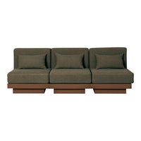Stylish green fabric sofa with clean lines and seamless brown base, perfect for modern living spaces.