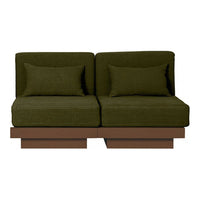 Olive green fabric sofa with a simple modern design and contrasting brown wooden base.