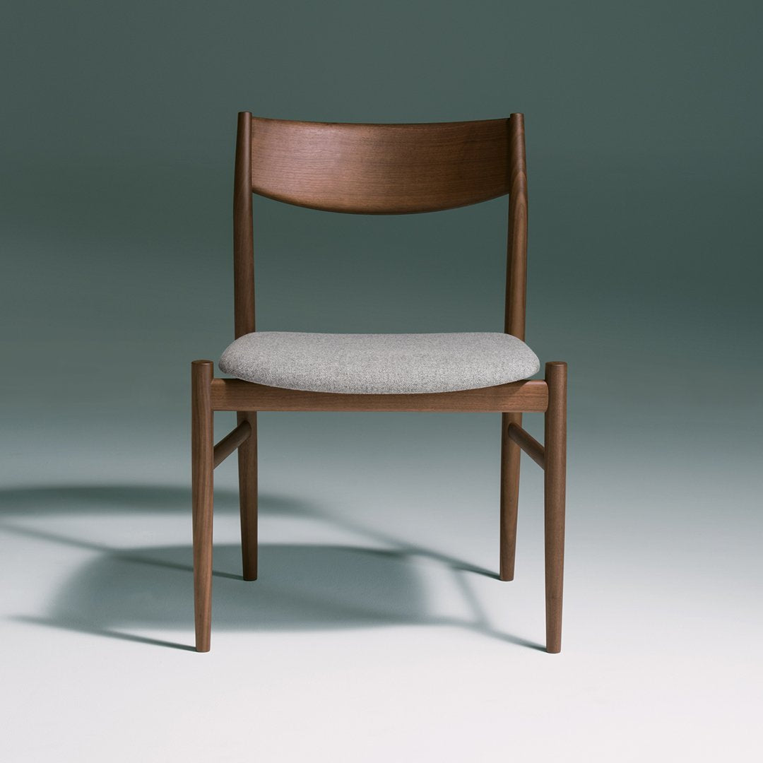 Wooden chair in rich brown with a light grey fabric seat, featuring a minimalist design and smooth lines.