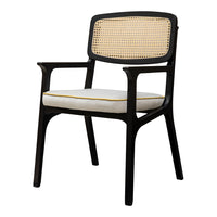 Black wooden chair with a rattan backrest and a white cushion accented with yellow trim. Elegant and modern design.