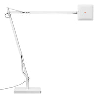 White modern desk lamp with a sleek design and minimalistic finish. Straight lines and smooth surfaces.