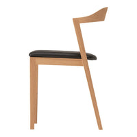Natural wood finish with a sleek black cushion, featuring minimalist design and modern lines.