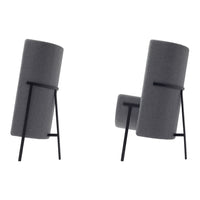 Gray upholstered chair with a sleek black metal frame, featuring a modern cylindrical backrest design.