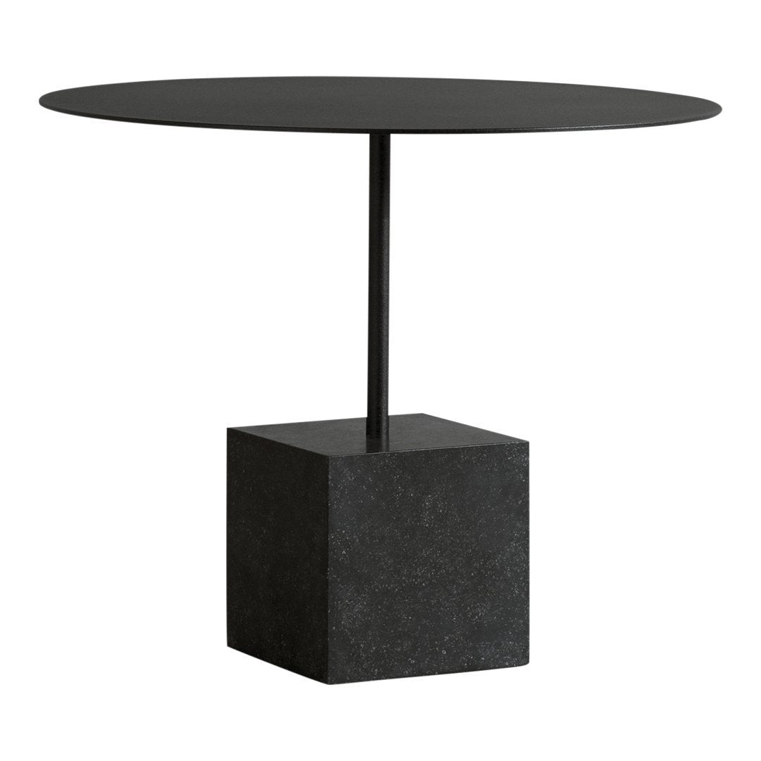 Black round tabletop on a sleek black geometric base, minimalist design perfect for modern interiors.