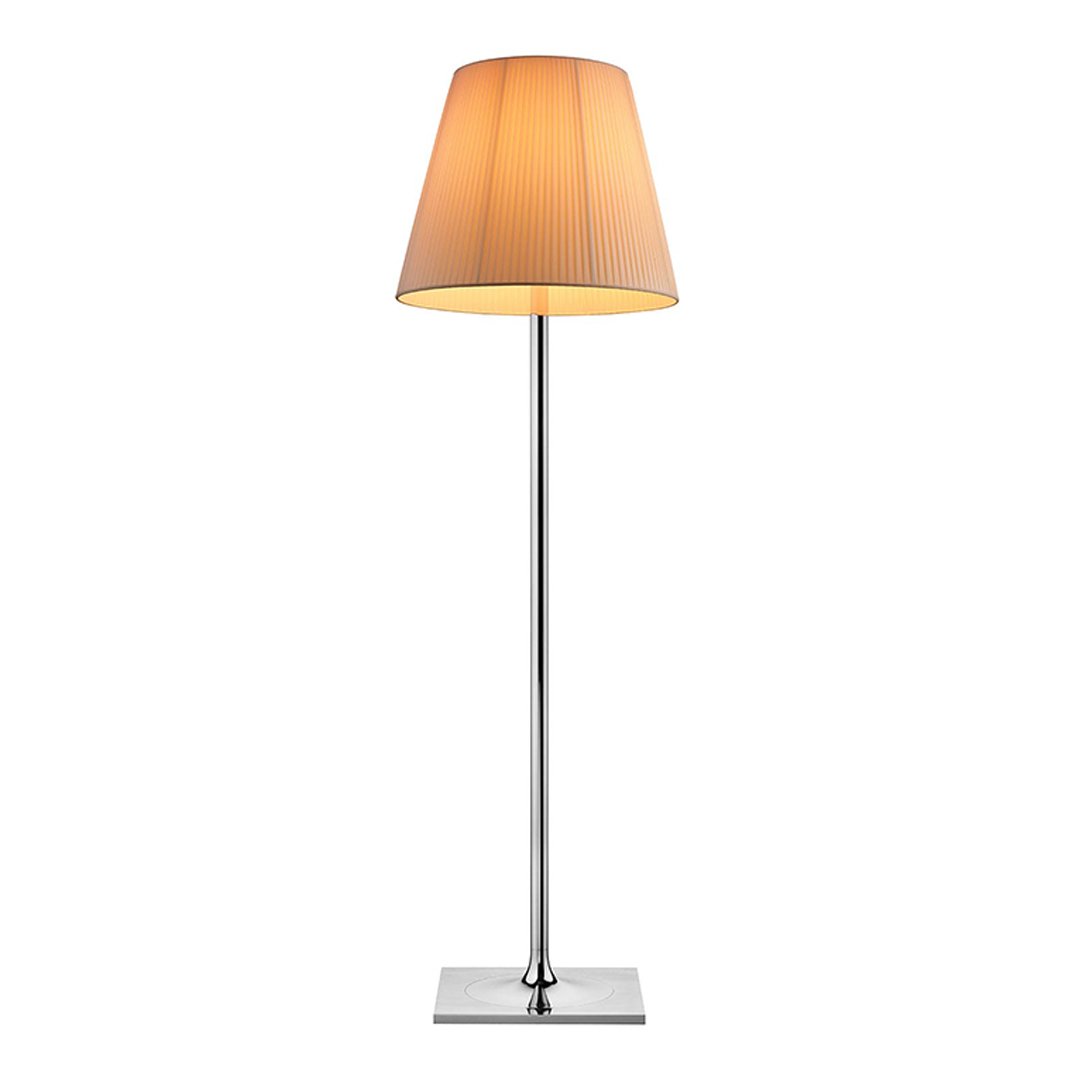 Tall chrome floor lamp with a warm, orange fabric shade, showcasing a sleek, modern design. Perfect for any decor style.