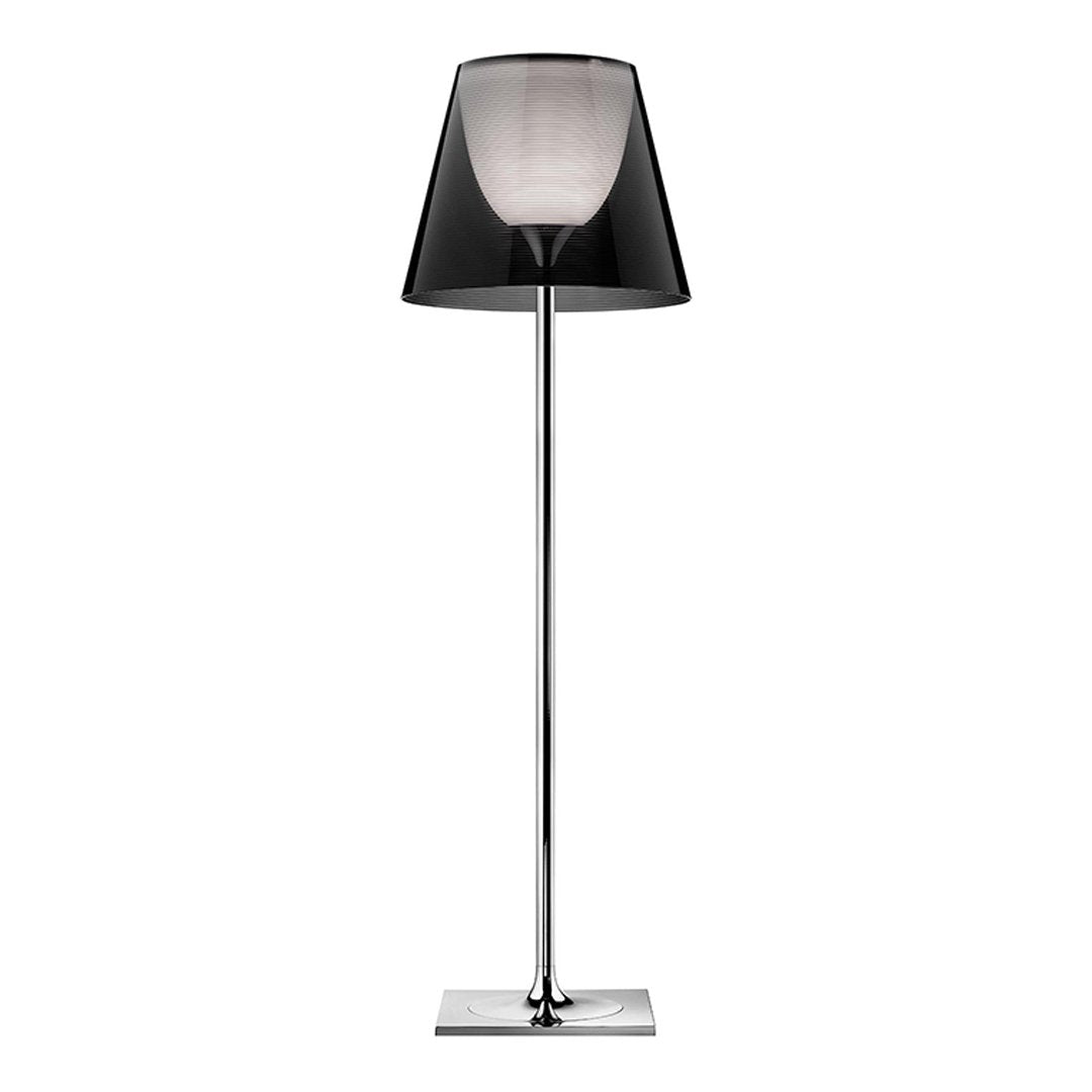 Modern black and transparent gray floor lamp with a sleek chrome base and minimalist design.