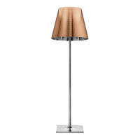 Sleek silver lamp with a textured copper shade, ideal for modern and stylish decor.