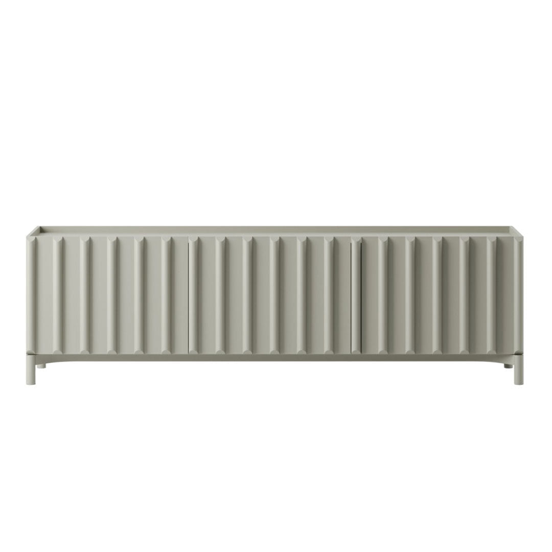 Light gray storage bench with vertical ribbed pattern, adding a modern touch to any space.