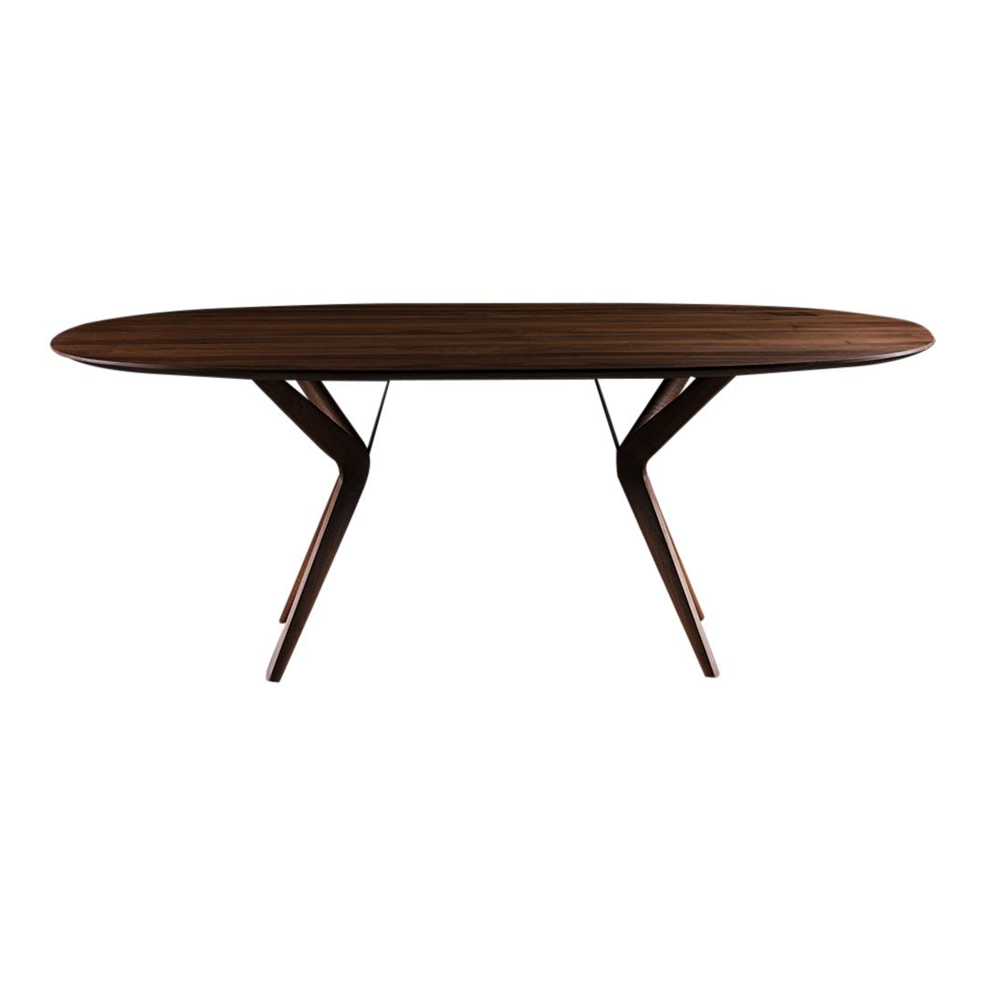 Oval dark brown dining table with sleek wooden legs, showcasing a modern minimalist design.