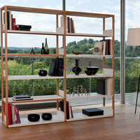 Modern wooden bookshelf featuring natural wood tones and white shelves, showcasing a minimalist design.