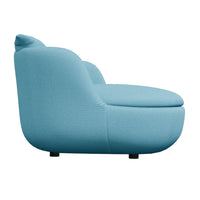 Sky blue modern chair with a smooth, curved shape and textured fabric, perfect for contemporary interiors.