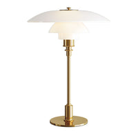 Gold lamp with white glass shades and sleek modern design. Elegant, minimalistic style perfect for any décor.