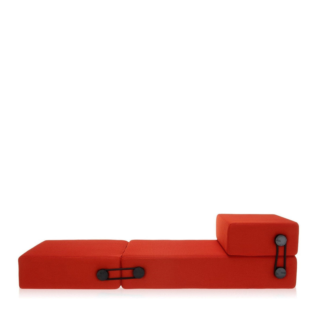 Bold red modular couch with a solid color design and contrasting black fasteners, ideal for modern interiors.