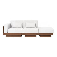 Modern sectional sofa with white cushions and a sleek brown wooden base, perfect for contemporary decor.