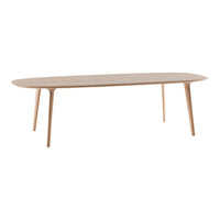 Light natural wood oval table with smooth finish and slender tapered legs. Perfect for modern minimalist decor.