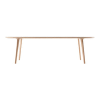 Light wood dining table with a smooth surface and minimalist design, showcasing natural beige tones and clean lines.
