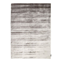 Gray to white gradient area rug with a subtle sheen and textured pattern, perfect for modern decor.