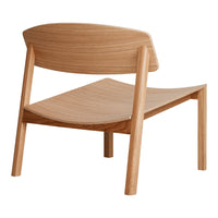 Natural wood chair with light and dark wooden tones, featuring smooth, minimalistic curves and a sleek design.