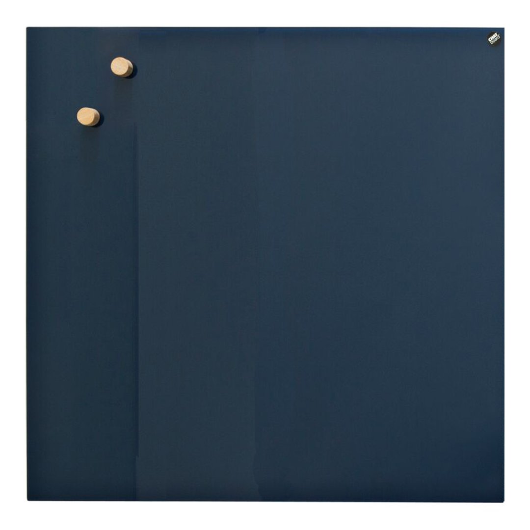 Navy blue board with two wooden pegs and a smooth surface for notes or photos. Ideal for home or office decor.