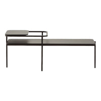 Minimalist black metal bench with sleek lines and a smooth surface. Modern design suitable for any decor.