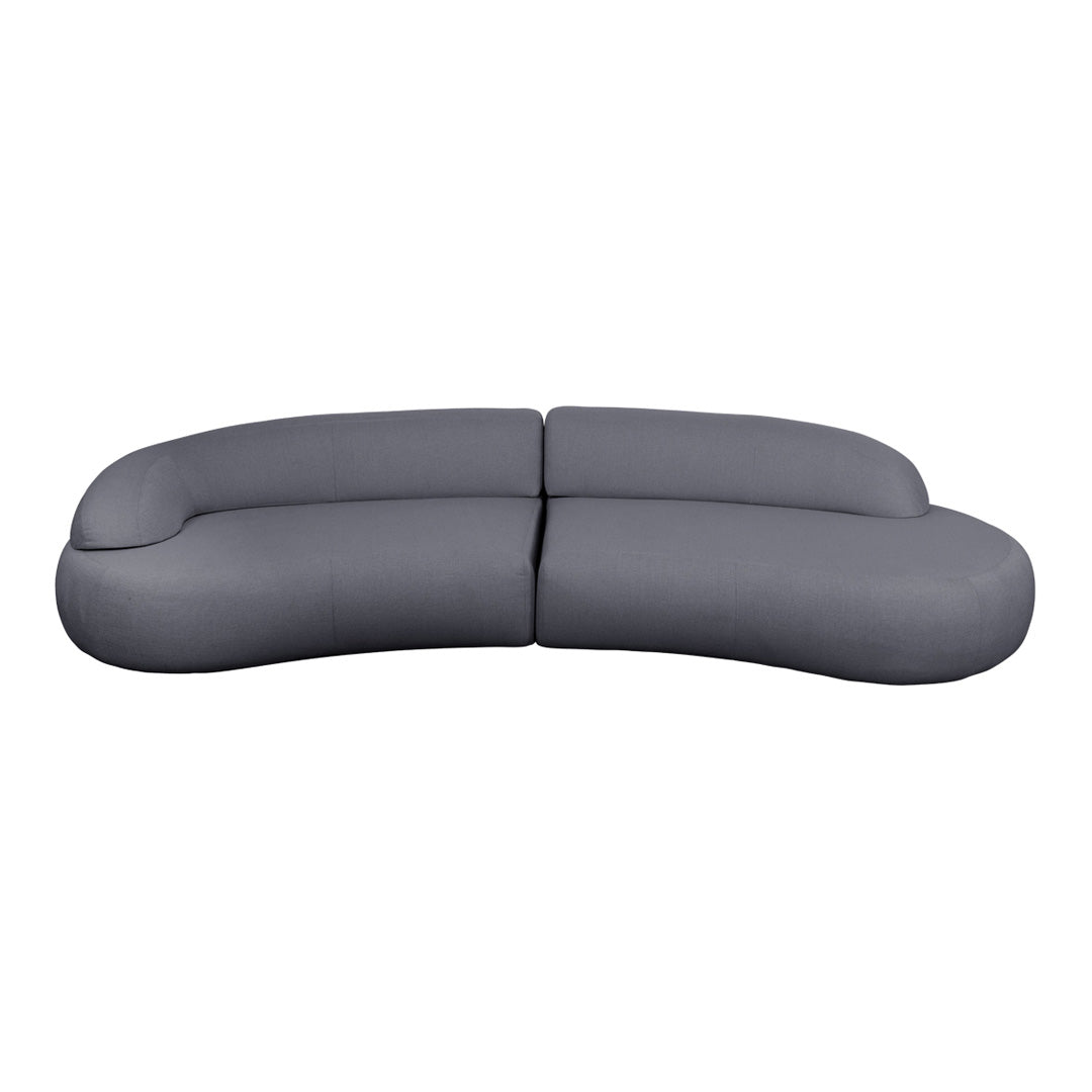 Curved gray sofa with a smooth, minimalist design, perfect for modern living spaces.